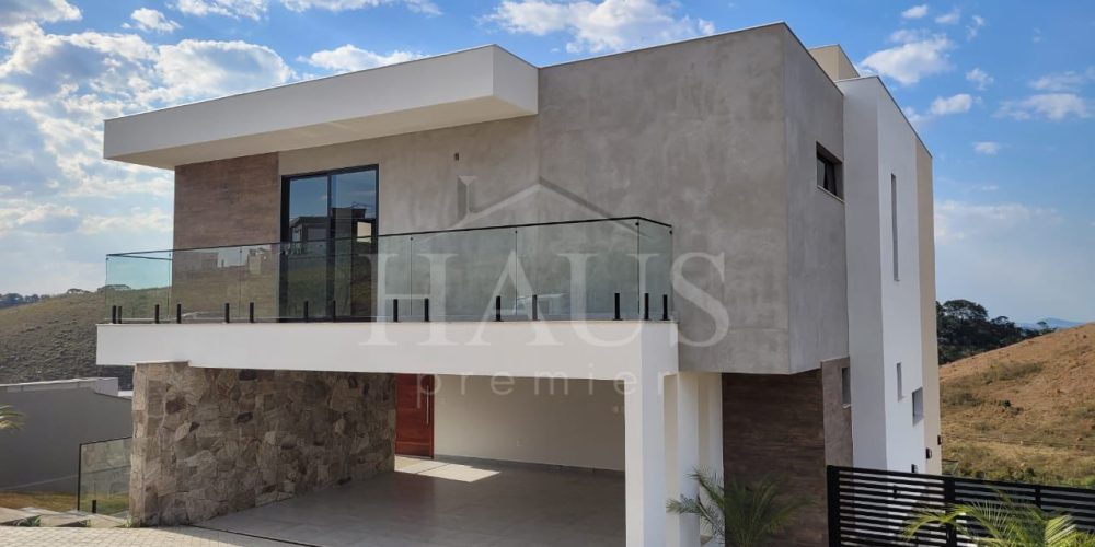 Residência com vista permanente para área de preservação no Alphaville Juiz de Fora.